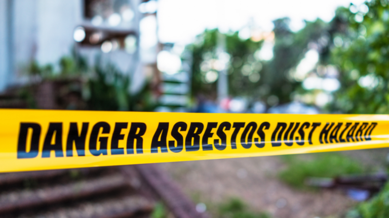Asbestos Danger Yellow Hazard Tape that says Danger Asbestos